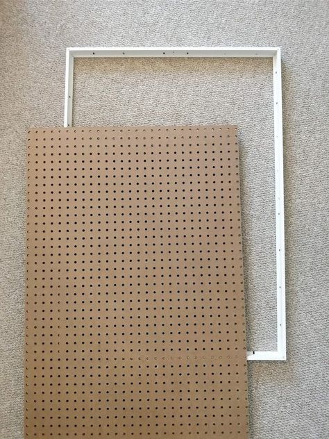 Pegboard Craft Room, Ikea Pegboard, Diy Pegboard, Pegboard Ideas, Craft Tables With Storage, Crayon Organization, Craft Paper Storage, Pegboard Display, Ikea Frame