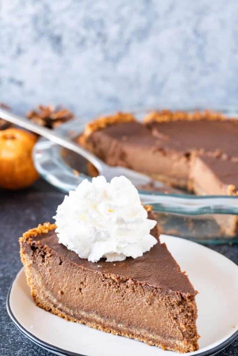 A slice of Chocolate Pumpkin Pie Pumpkin Pie Easy, Meringue Crust, Brown Sugar Pie, Libbys Pumpkin Pie, Best Lemon Meringue Pie, Chocolate Pumpkin Pie, Classic Pumpkin Pie, Meringue Topping, Pumpkin Pie Recipe Easy