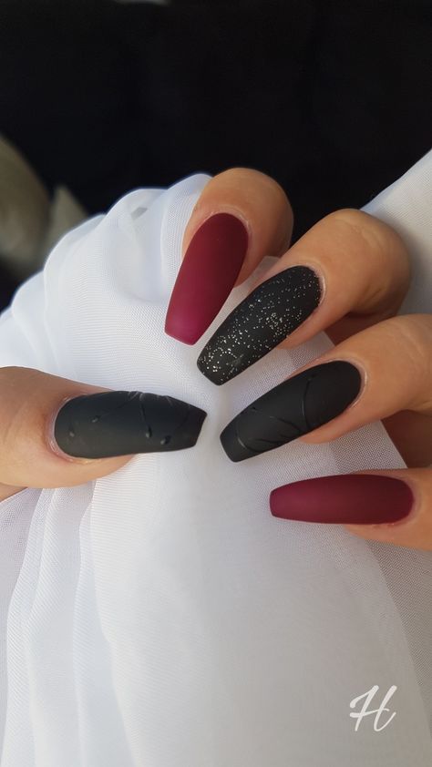 Red And Black Matte Nails Design, Matte Black And Maroon Nails, Red Black Matte Nails, Dark Red Nails With Black Design, Red And Black Nails With Glitter, Acrylic Matte Nail Designs, Black And Red Nails Matte, Black And Maroon Nail Ideas, Short Acrylic Nails Almond Black And Red