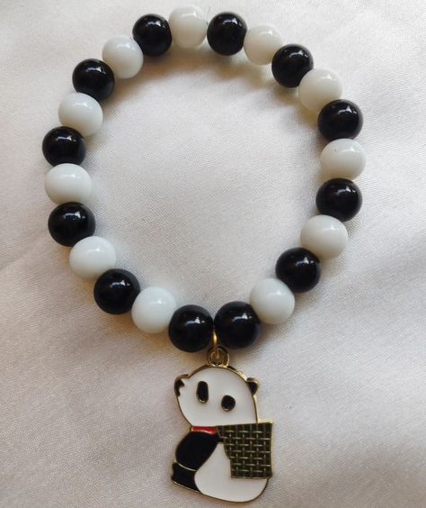 "Keeping it classic with a black and white panda bracelet 🖤🐼" Contact me via DM for price. #braceletlover #wristwear #wristswag #wristcandy #wristelegance #wristparty #wristgame #wristflower #blackaesthetic #blacklove #blackbeauty #blackandwhite #panda #pandalover #braceletoftheday #newcharms #newcollection #newarrivals Panda Bracelet, Girly Bracelets, Wrist Flowers, Wrist Candy, Wrist Game, Wrist Wear, Black Love, Black Aesthetic, A Black