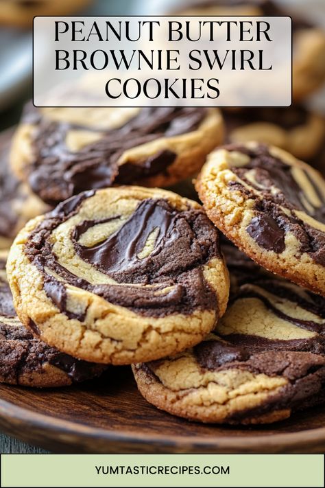 Love peanut butter? Love brownies? Combine them in these sensational swirl cookies! Each cookie is a perfect blend of sweet chocolate and creamy peanut butter, baked to perfection. Easy to make and impossible to resist—get the recipe now!

#SwirlCookies #PeanutButterDreams #BrownieLoversUnite #DessertInspo #CookieHeaven Peanut Butter Swirl Cookies, Peanut Butter Brownie Swirl Cookies, Peanut Butter Brownie Recipes, Brownie Swirl Cookies, Brownies With Peanut Butter, Peanut Butter Brownies Recipe, Swirl Cookies, Peanut Butter Brownie, Christmas Baking Recipes