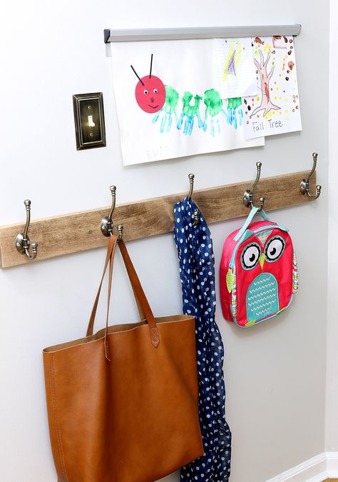 Use coat hooks to keep kids backpacks, coats, and scarves neat and organized Displaying Kids Artwork Diy, Backpack Hangers, Display Kids Artwork, Diy Kids Art Display, School Station, Kids Artwork Display, Backpack Hanger, Displaying Kids Artwork, Kids Art Galleries