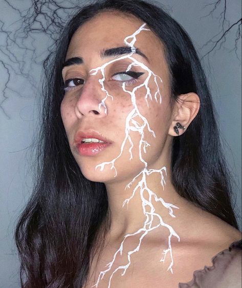 Storm Makeup Look, Lightening Makeup Looks, Lightning Scar Face, Dripping Eye Makeup, Lighting Bolt Makeup Look, Lighting Bolt Face Paint, Lightening Face Paint, Lightning Marks On Skin, Lightning Halloween Costume