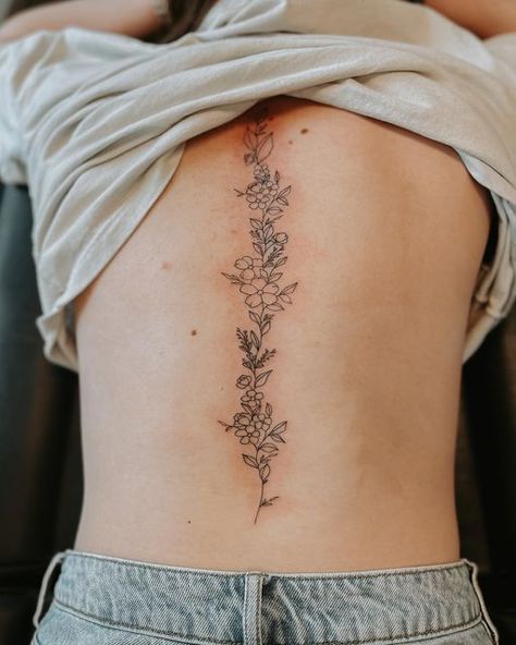 vibe tattoo utah on Instagram: "this floral spine piece is going to be so cute for summer 🤩🌷 appointment type: medium-large (depending on detail) • • • #utahtattooartist #finelinetattooartist #finelinetattoos #womenstattoos #trendytattoos #tiktok #tattok #tattooideas #tattooinspo #utahtattoostudio #vibetattooutah #microinfluencer #minimalistictattoo #contentcreator #instagramgrowth #tattooinfluencer #explore #explorepage #tattoogoals #summertattoos #spinetattoo #daintytattoos" Elegant Spine Tattoos, Floral Back Tattoos, Basic Tattoos, Western Tattoos, Spine Tattoos For Women, Stylist Tattoos, Classy Tattoos, Spine Tattoo, Dainty Tattoos