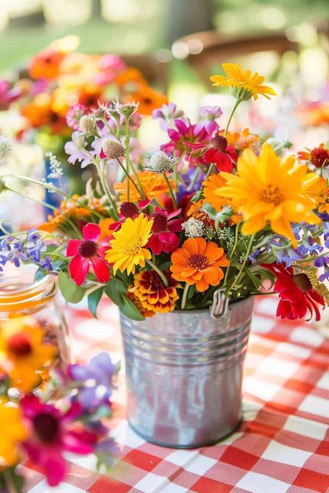 22 Creative Bridal Shower Themes To Make Your Celebration Unforgettable • Colorful Flowers Centerpieces, Colorful Wedding Shower Ideas, Fall Wildflower Wedding Decor, Wild Flower Decorations Wedding, Wildflower Party Ideas, Wild Flower Wedding Shower Ideas, Wildflower Wedding Shower Ideas, Floral Wedding Shower Ideas, Wildflower Table Centerpieces