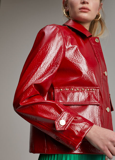 Patent leather effect short jacket. Closed with double carriage metal zipper. Patch pockets with front mat. Loop detail with metal button on cuffs. Patent Leather Jacket, Short Jacket, Metal Zipper, Metal Buttons, Patch Pocket, Patent Leather, Leather Jacket, Cuff, Zipper