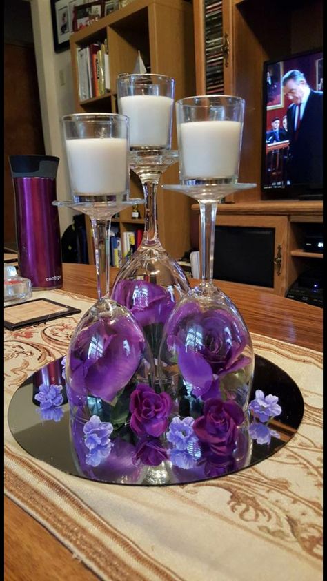 Black And Purple Wedding Centerpieces, Easy Party Centerpieces Diy, Purple And Gold Wedding Centerpieces, Purple And Gold Table Centerpieces, Purple Centerpiece Ideas, Wine Glass Vase Centerpiece, Purple And Grey Centerpieces Wedding, Picture Frame Centerpiece Ideas Birthday, Purple And Silver Wedding Centerpieces