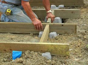 How to Building a Deck on the Ground Design ~ http://www.lookmyhomes.com/learning-more-than-how-to-building-a-deck-on-the-ground/ Deck On Concrete, Build A Floating Deck, Ground Deck, Ground Level Deck, Building A Floating Deck, Stone Deck, Laying Decking, Floating Deck, Deck Construction