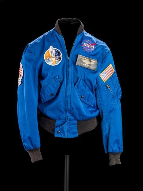 Whether in a classroom or on the tennis court, in the lab or on the launch pad, it was clear that Dr. Sally Ride would reach great heights. Artifacts in our collection — her flight jacket, tennis racquet, telescope, Star Trek pin, and more — help us tell all the ways a love of science made Sally shine and inspire us to #ShineLikeSally too. Nasa Jacket, Space Shuttle Challenger, Sally Ride, Flying Jacket, Nasa Logo, Nasa Astronauts, Concept Clothing, American Woman, Space Shuttle