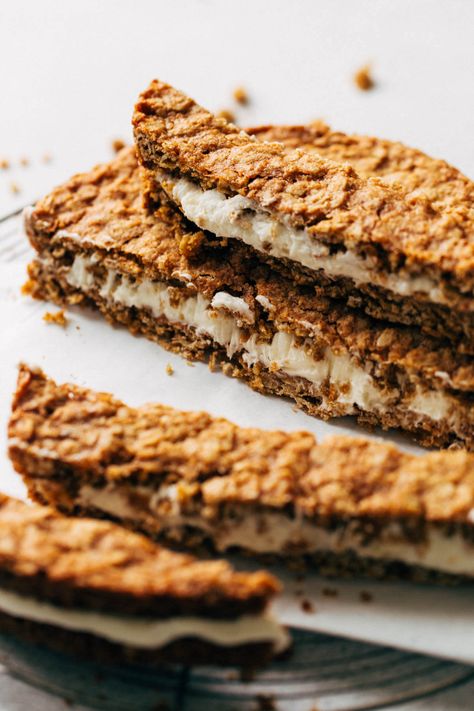 These oatmeal cream pie cookie bars are like slicing into one giant oatmeal cream pie. Two layers of chewy oatmeal cookie are baked into 8 rounds and filled with sweet buttercream frosting. #oatmealcreampie #oatmealcookies #sandwichcookies #butternutbakery | butternutbakeryblog.com Sweet Buttercream Frosting, Chewy Oatmeal Cookie, Oatmeal Cream Pie, Butternut Bakery, Oatmeal Cream Pies, Oatmeal Cookies Chewy, Oatmeal Cream, Oatmeal Cookie, Pie Bar