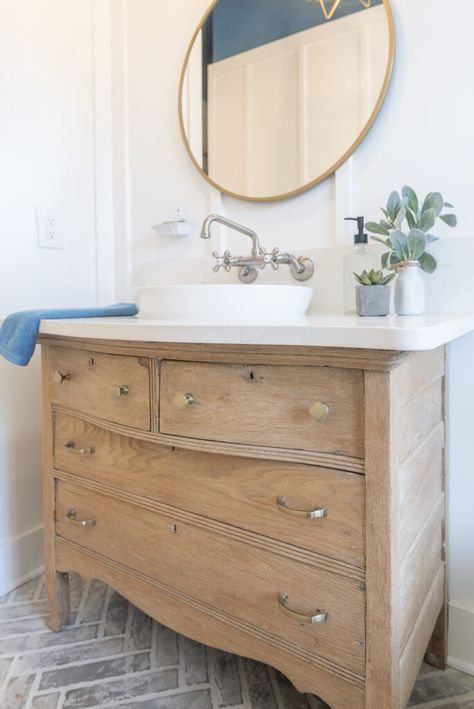 A repurposed wood antique vanity saves money when building a home Brick Tile Floor, Kitchen Cabinets And Flooring, Music Room Office, Dresser Vanity Bathroom, Barn Light Fixtures, Minimalist Cottage, Oak Farmhouse, Lvp Flooring, Dresser Vanity