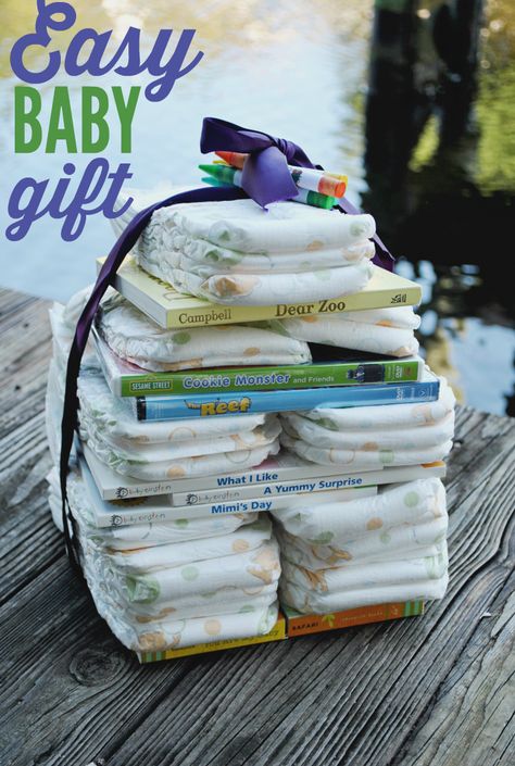 Need an easy and fast idea for a baby shower gift? Create this books and diaper tower using ribbon, diapers, and DVDs. No need to wrap this one! Diaper Tower, Diaper Gifts, Boy Baby Shower Ideas, Baby Gift Ideas, Create This Book, Diy Baby Shower Gifts, Diy Baby Gifts, Single Pearl, Shower Bebe