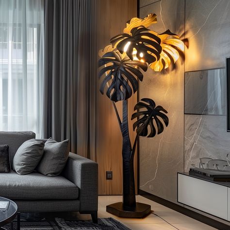 Illuminate your living space with this exquisite Monstera-inspired corner lamp. The sleek frame, adorned with intricate monstera leaf patterns, casts beautiful shadows, creating a serene oasis. The soft, warm LED glow offers a cozy ambiance, perfect for relaxing evenings. With a sturdy base and adjustable height, this lamp enhances any corner with botanical charm and contemporary style. Conceptual AI Art Follow @ecosapiens for more! Earth Room, Corner Lamp, Leaf Patterns, Cozy Ambiance, Monstera Leaf, Leaf Pattern, Contemporary Style, Home Interior Design, House Interior