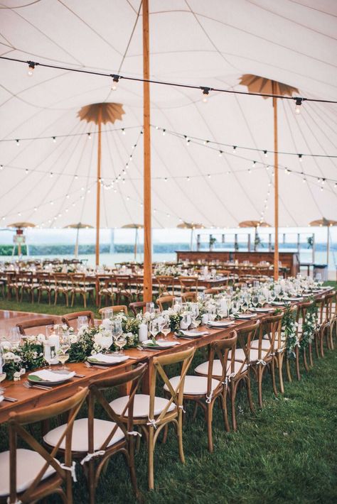 reception tables and chair lineup under tent with lighting Newport Wedding, West Coast Fashion, Rhode Island Wedding, Cape Cod Wedding, Wedding Tent, Bay Leaf, England Wedding, Luxury Wedding Planner, Head Table