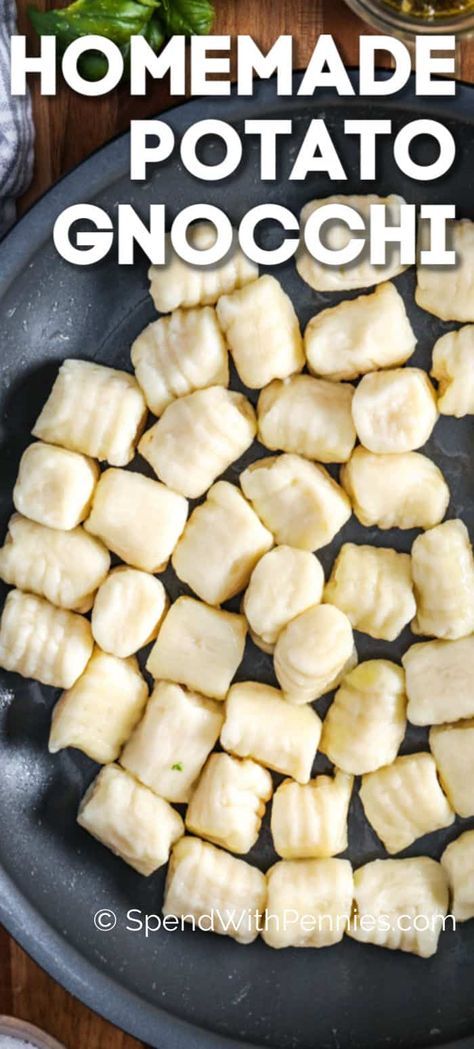 Homemade gnocchi is positively fail-proof! Made with a handful of ingredients this simple homemade pasta recipe is a family favorite. Serve tossed in pesto, baked in cheese, or on its own! #spendwithpennies #gnocchi #pastarecipe #maincourse #homemadepasta #pasta Baked Potato Gnocchi, Recipes With Homemade Noodles, Potatoes Gnocchi Recipes, Goochies Recipe, Potato Pasta Recipes, Potato Pasta Gnocchi, Potatoe Gnocchi, Homemade Gnocchi Recipes, Zucchini Gnocchi