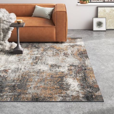 Steelside™ Pierce Abstract Machine Made Power Loom Polyester/Polypropylene Area Rug in Gray/Ivory/Golden Beige & Reviews | Wayfair Rugs With Camel Leather Couch, Brown Leather Couch Living Room Rugs, Gray And Camel Living Room, Grey And Camel Living Room, Grey And Brown Living Room Decor, Industrial Living Room Rug, Cognac Leather Couch Living Rooms, Overlapping Pattern, Brown Leather Couch Living Room