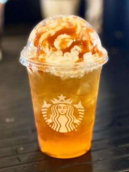 10 Best Starbucks Apple Drinks: Fruity & Refreshing! Starbucks Drinks With Apple Juice, Starbucks Apple Juice Drinks, Carmel Apple Starbucks Drink, Carmel Drink From Starbucks, Carmel Drink At Starbucks, Mary Aesthetic, Apple Chai, Apple Cider Drink, Apple Drinks