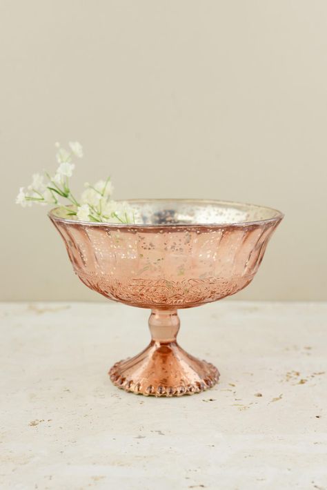 centerpiece compote example: Love the Mercury Glass Compote Rose Gold 7x5.5in Rose Gold Centerpiece, White Elephant Christmas, Bouquet Succulent, Glass Pillar Candle Holders, Gold Centerpieces, Pedestal Vase, Unique Roses, Wedding Table Flowers, Floral Foam