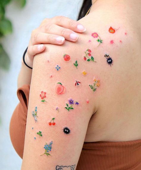 Back Tattoos For Guys Spine, Tatuaje Studio Ghibli, Shoulder Tattoo Ideas, Small Colorful Tattoos, Peach Tattoo, Cool Shoulder Tattoos, Floral Tattoo Shoulder, Back Tattoos For Guys, Cute Little Tattoos