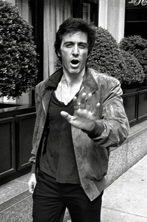 DEFENSIVE DRESSING | Pictured here in 1979, Al Pacino stylishly confronted paparazzo Ron Galella in an urbanely macho suede bomber jacket. WIREIMAGE Al Pacino, A Face, A Man, Black And White, White, Black