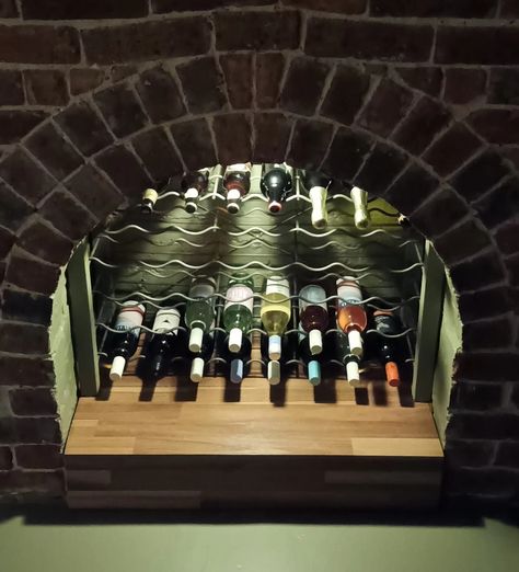 Wine Rack Fireplace, Wine Rack In Fireplace, Fireplace Wine Rack, Fireplace Wine Storage, Fireplace Repurpose Ideas, Converted Fireplace, Repurpose Fireplace, Repurposed Fireplace, Frat Room