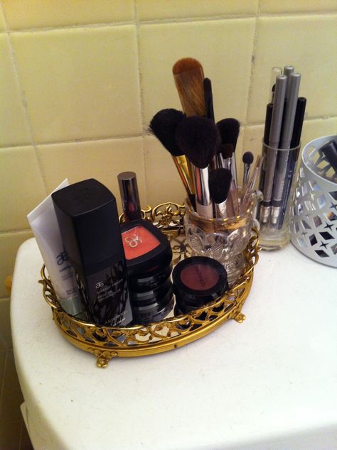 In case anyone is wondering how the makeup storage project was completed:  40's vanity tray, small vintage bud vase, and vintage condiment holder for brushes.  Thanks Cambridge antiques market Makeup Organization Vintage, Makeup Basket Storage, Vintage Makeup Brush Holder, Vintage Makeup Holder, Vintage Makeup Organization, Vintage Makeup Storage, Makeup Basket, Makeup Caddy, Rangement Makeup