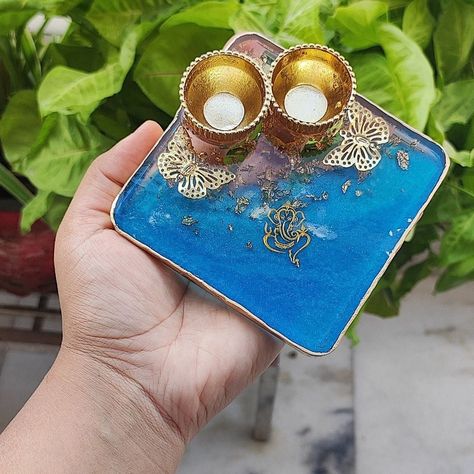 Resin pooja thalis available in different sizes 4” resin pooja thali starting at rs 299 6” resin pooja thali starting at rs 599 8” resin pooja thali starting at rs 799 10” resin pooja thali starting at rs 999 (Price will be changed according to designs of particular thalis) Get free bhai and bhabhi resin rakhi in each pooja thali ♥️ #resinpoojathali #resinpoojaplate #resinpoojathalis #resinpoojathaali #resinpoojathaliforrakshabandhan #poojathalidecoration #resinpoojathaliorders #viralpost #... Resin Thali, Karwa Chauth Thali, Aarti Thali, Diwali Diya Decoration, Diwali Pooja, Diya Decoration, Pooja Thali, Ganesh Idol, Diy Diwali Decorations