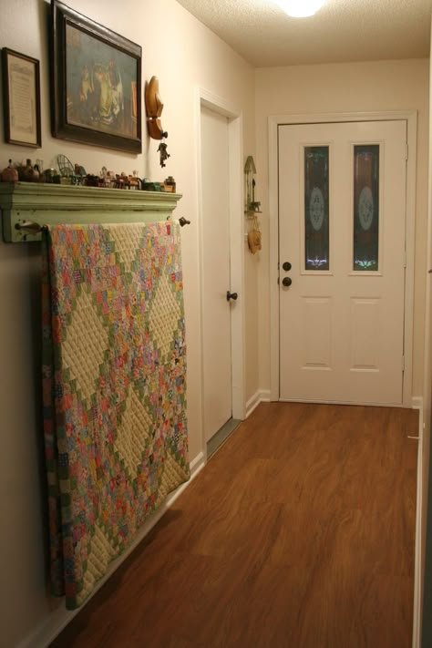 I like the curtain rod to hang a quilt.. Quilts On The Wall, Wall Quilt Hanger Ideas, How To Display A Quilt On The Wall, Wall Quilt Display, Quilt Hangers For Walls, Quilt Hanging Ideas Display, Quilt Display Ideas Wall Hangings, Quilt Displays Ideas, Display Quilts On Wall