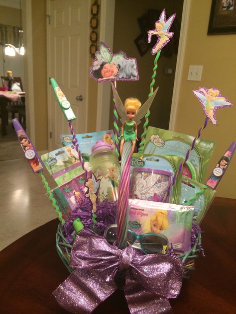 Tinkerbell basket- baby's first birthday Tinkerbell Gifts, Tinkerbell Birthday, Bicycle Spokes, 50th Birthday Decorations, Baby's First Birthday, First Birthday Dresses, Birthday Gift Baskets, Roller Coaster Ride, 1st Birthday Gifts