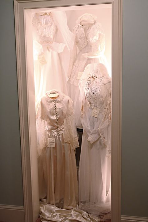 Displaying the dresses of MOB, GMOB, MOG and GMOG at your wedding- I think this is AMAZING! Wedding Dress Shadow Box, Bridal Shower Display, Picture Arrangements On Wall, Wedding Dress Display, Wedding Dress Storage, Grandma Dress, Dress Storage, Picture Arrangements, Groom Wedding Dress