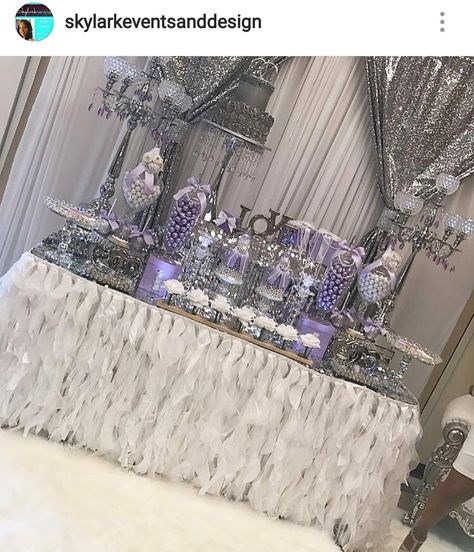 Lavender, silver, and white Bridal shower dessert table and Decor Silver Desserts, Silver Dessert Table, Birthday Decorations Silver, Spring Bridal Shower Favors, Purple Quinceanera Theme, Bridal Shower Dessert Table, Players Ball, Senior Table, Bridal Shower Desserts Table