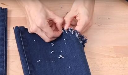 This is a guide to fraying jeans in different ways. Learn how to fray jeans to make them more on-trend, with these simple DIY techniques. How To Fray Bottom Of Jeans, How To Fray Jeans, Fraying Jeans, Jeans Makeover, Frayed Jeans Diy, Diy Jeans Refashion, Fringe Bottom Jeans, Frayed Bottom Jeans, Diy Distressed Jeans