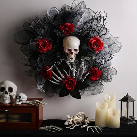 PRICES MAY VARY. Spooky Halloween Garland: Bring the haunted house vibes to life with this stunning garland adorned with red roses, skulls, and spider webs. Versatile Decoration: Perfect for hanging in your spooky haunted house or bar, this garland can also be used as a wreath for Halloween parties and events. Ghostly Design: Featuring eerie black and red roses, creepy skull accents, and dead branches, this artificial wreath will send chills down your spine. Weatherproof Material: Whether used i Cheap Halloween Party, Rosé Halloween, Mesh Garland, Deco Mesh Garland, Haunted Mansion Halloween, Red Rose Wreath, Halloween Mesh Wreaths, Halloween Door Wreaths, Door Hanging Decorations