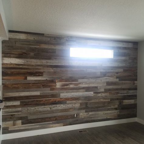 How to Install a Reclaimed Barn Wood Accent Wall | McArthur Homes Barn Wood Accent Wall, Barnwood Accent Wall, Barnwood Frames, Farmhouse Bathroom Mirrors, Reclaimed Wood Accent Wall, Tongue And Groove Walls, Brick Hearth, Game House, Barnwood Wall