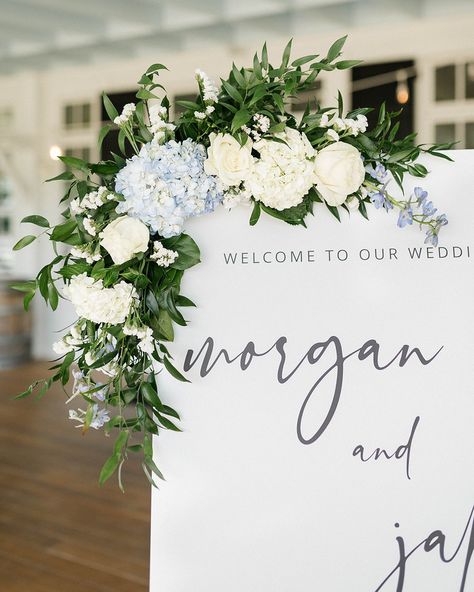 The little details and the pops of hydrangea blue 🩵 all the best things from a Southern wedding in the Summertime. _______________________________ Photography | @brittanylowephotos Videography | @gibbyvisuals Planning + Design | @thehiveweddingco @heatherwiththehive Venue | @uppershirleyweddings Beauty | @ave42salon Bridal Gown | @annalisebridal Florals | @weddingsbyvogue Cake | @pearlsbakeshoppe Rentals | @partyperfect804 Band | @10spotband Ceremony Musicians | @quincesq Suits ... Blue Hydrangea Wedding Cake, Wedding Sign Florals, Hydrangea Wedding Theme, Welcome Sign Wedding Flowers, Hydrangea Wedding Arch, Welcome Sign Flowers, Summertime Photography, Wedding Cake Hydrangea, Hydrangea Flower Arrangements