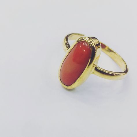 Natural Red Coral Ring. Capsule shaped Red Coral ring set in 18kt Yellow Gold. #coraljewelry #gemstonejewelry #gemstonerings Coral Finger Ring Designs, Coral Finger Ring, Latest Gold Design, Coral Rings, Coral Stone Ring, Red Coral Ring, Red Coral Jewellery, Gold Temple Jewellery, Diamond Pendants Designs