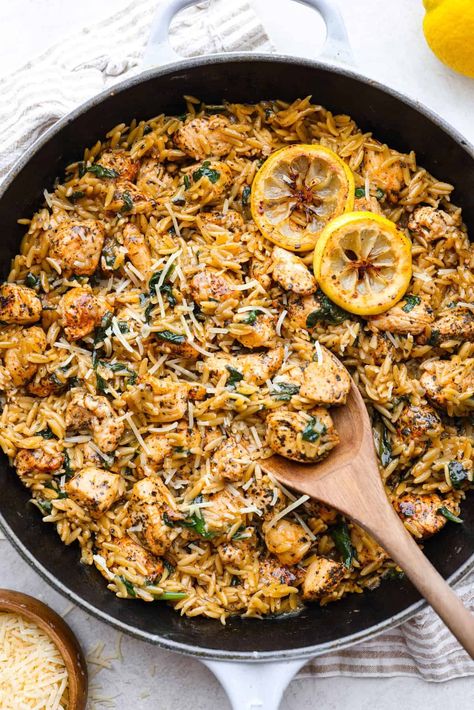 One-Pan Lemon Chicken Orzo is a comforting, well-rounded meal! Tender, juicy chicken pieces are joined with orzo pasta in a bright lemon sauce, resulting in melt-in-your-mouth deliciousness! Your whole family will adore this tasty dinner! Chicken Orzo Skillet One Pot, One Pan Chicken Lemon Orzo, Greek Chicken And Lemon Rice One Pot, One Pot Lemon Chicken Orzo, Greek Lemon Chicken Orzo, Easy Orzo Recipes, Lemon Orzo Pasta, Chicken Orzo Pasta, University Food