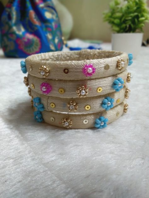 https://youtu.be/hj-axL2znHA Embroidered Bangles, Diy Bangles, Embroidery Jewellery, Fancy Bangles, Silk Thread Bangles Design, Hand Embroidered Jewelry, Silk Bangles, Thread Bangles Design, Baby Shoes Diy