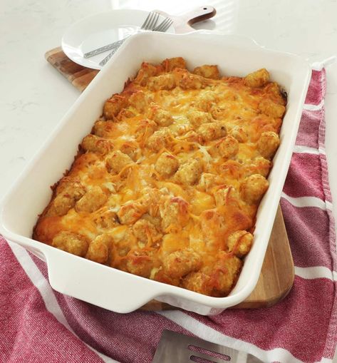 Breakfast casserole with tater tots is an easy recipe. The tater tots stay crispy with a layer of gooey cheese, sausage and eggs. Perfect recipe for brunch, holidays and even Christmas morning. Easy Breakfast Casserole With Tater Tots, Breakfast Casserole With Tater Tots Easy, Make Ahead Tater Tot Breakfast Casserole, Tater Tot Egg Bake, Easy Tater Tot Casserole Simple, Egg Tater Tot Casserole, Breakfast Casserole With Tater Tots, Casserole With Tater Tots, Overnight Egg Casserole