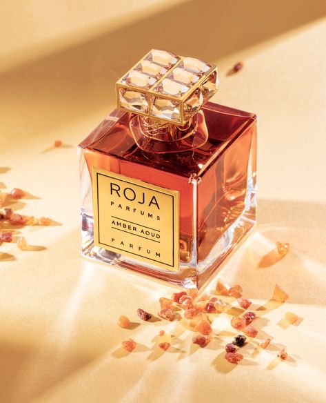 An enchanting experience known as “The Amber Aoud Effect”, the harmonious pairing of Ambergris and Agarwood wrap you up in an embrace of Middle Eastern opulence. #Roja #Rojaperfume #nichefragrances #ascentluxurycosmetics Roja Amber Aoud, Catchy Business Name Ideas, Water Drops, Women Fragrance, Business Names, Amber, Fragrance