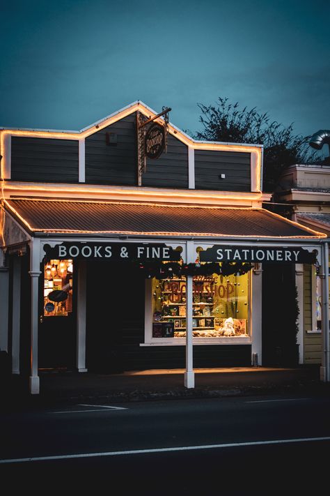 Cosy independent bookshop store front decorated with outdoor lights at sunset, located in Greytown, New Zealand Primary School Classroom, Fine Stationery, Book Shop, Wooden Pencils, Log Burner, Stationery Shop, Vintage Market, Tour Guide, Book Club Books