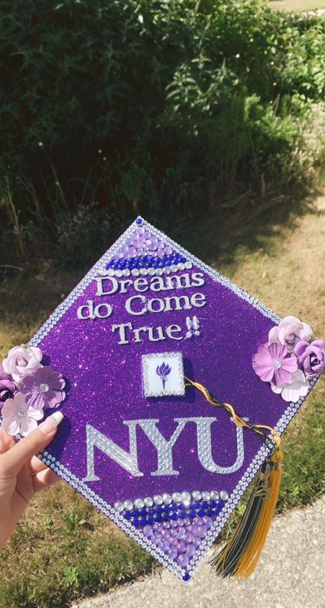 Purple graduation cap Nyc Graduation Cap, Nyu Vision Board, New York University Graduation, Nyu Student Aesthetic Wallpaper, New York University Campus, Nyu Grad Cap, Nyu College Aesthetic, Nyu Medical School Aesthetic, Nyu Campus Aesthetic