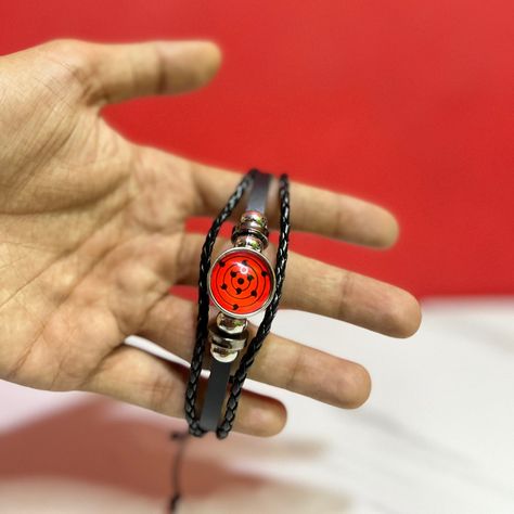 Naruto Mangekyo Sharingan Premium Bracelet Do you love anime cosplay items that give you a dashing look? Well, Naruto Wrist Bracelet can be a good fit for your taste. Being an anime fan, you would surely have watched Naruto! Cosplaying anime has always been a fun part of being an anime fan. Also, when we visit anime cosplaying events, it feels so special to be present there, among others cosplaying different anime characters! However, what about something that you can wear every day? Someth... Naruto Items, Naruto Bracelet, Naruto Jewelry, Cosplay Items, Wrist Bracelet, Anime Cosplay, An Anime, Cosplay Anime, Naruto