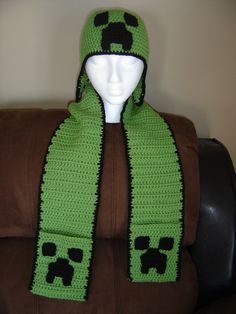 Minecraft crochet earflap hat with pocket scarf.  Did lots of those for boys.  They sure love there minecraft. Minecraft Crochet Patterns, Minecraft Flowers, Crochet Earflap Hat, Minecraft Crochet, Crochet A Bear, Crochet Character Hats, Bear Ideas, Cutest Crochet, Pocket Scarf