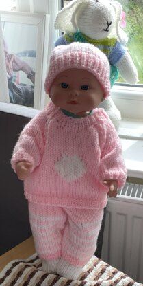 Baby doll heart outfit Knitting pattern by linmaryknits | LoveCrafts 16 Inch Doll Clothes Knitting Patterns Free, Baby Annabelle Knitting Patterns Free, Free Dolls Clothes Knitting Patterns English, Knitting Dolls Clothes Free Patterns English, Baby Doll Outfit, Baby Knitting Patterns Free Newborn, Knit Baby Doll, Heart Outfit, Baby Born Kleidung