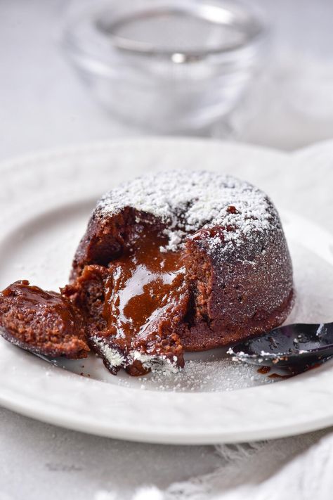 Decadent chocolate lava cake is just minutes away with this delicious recipe. Get restaurant-style chocolate molten lava cake with ooey, gooey, melty centers that are perfect for chocolate lovers for Valentine’s Day, Easter or any special occasion. Made with just 6 ingredients, this recipe is quick and easy to make at home. Top lava cake topped with ice cream, whipped cream, or your favorite dessert toppings. Click through to get this awesome chocolate lava cake recipe!! #simpledessert #... Individual Lava Cakes, Restaurant Style Desserts, Hot Lava Cake, Lava Cake With Ice Cream, Chocolate Lava Cake Easy, Chocolate Lava Cake For Two, Lava Cake For Two, Nutella Lava Cake, Chocolate Molten Lava Cake