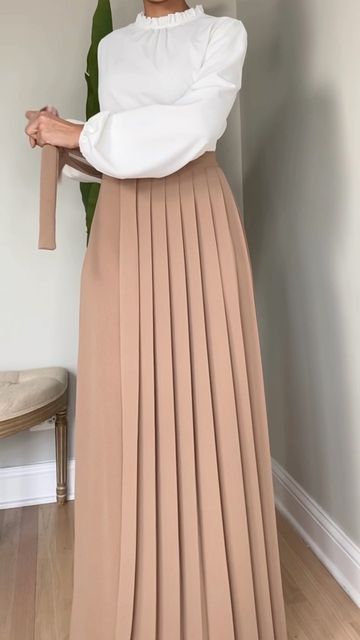 Spring Pleated Maxi Skirt With Wide Hem, Elegant Pleated Bottoms With Wide Hem, Relaxed Maxi Skirt With Pleated Wide Hem, Chic Pleated Bottoms With Wide Hem, Elegant Wide Hem Pleated Skirt, Elegant Bottoms With Lined Skirt And Wide Hem, Beige Full Length Pleated Skirt, Elegant Pleated Solid Culottes, Modest Pleated Flowy Skirt