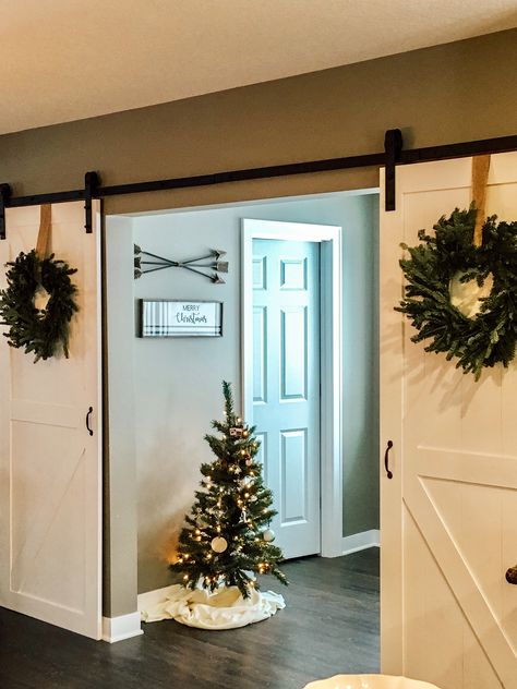 Simple Modern Farmhouse Christmas Decor Barn doors Simple Modern Farmhouse, Modern Farmhouse Christmas Decor, Modern Farmhouse Christmas, Indoor Barn Doors, Favorite Christmas Recipes, Double Barn Doors, Farmhouse Christmas Decor, Christmas Vibes, Barn Doors