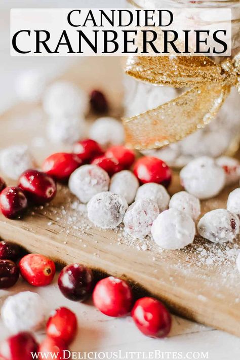 Candied Cranberries are a holiday staple, but this recipe that involves soaking the berries and then coated them in powdered sugar is all the rage thanks to it going viral on Tiktok. You can easily make these pops of sweet and tart delight to enjoy with your friends and family this season. Tiktok Sugared Cranberries, Candied Cranberries With Sprite, Candied Sugared Cranberries, Candies Cranberries Powdered Sugar, Cranberry Snacks Powdered Sugar, Candied Cranberries Powdered Sugar And Orange Juice, Sugared Cranberries Baked, Frosted Cranberries Powdered Sugar, Cranberry Tiktok