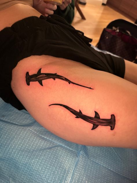 Shark tattoo on thigh Shark Around Knee Tattoo, Hammerhead Shark Tattoo Thigh, Shark Leg Tattoos Women, Shark Cover Up Tattoo, Shark Semicolon Tattoo, Whale Shark Hip Tattoo, Dark Shark Tattoo, Hip Shark Tattoo, 2 Sharks Tattoo